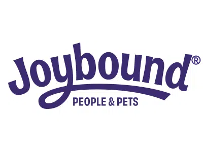 Logo of Joybound, featuring the text "Joybound" in purple script with the tagline "People & Pets" underneath in a straight font. The design emphasizes community support for both individuals and their pets.